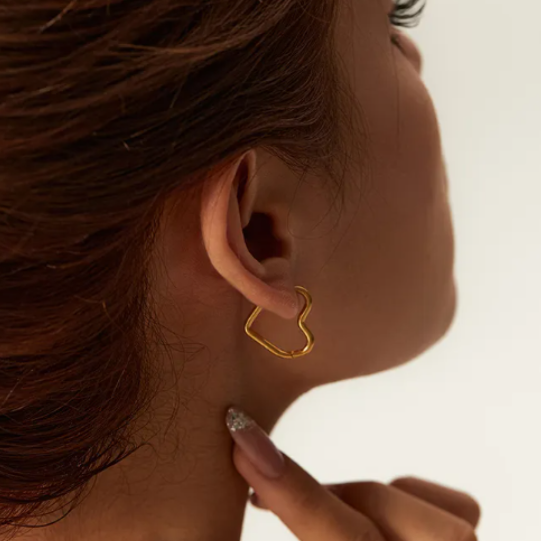 Valentine's Day Guide showing a girl wearing a pair of heart earrings
