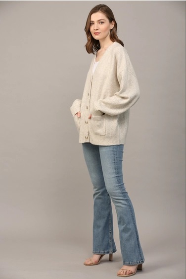 Cream wool cardigan on sale